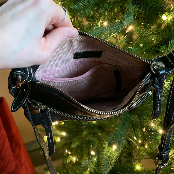 Black purse. Does have some wear and tear but great purse! - Picture 3 of 4